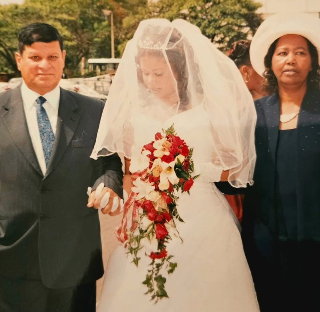 Farooq Asif Butt, Julie Gichuru and her mom when they walked her down the aisle on her wedding day. Photo: Instagram