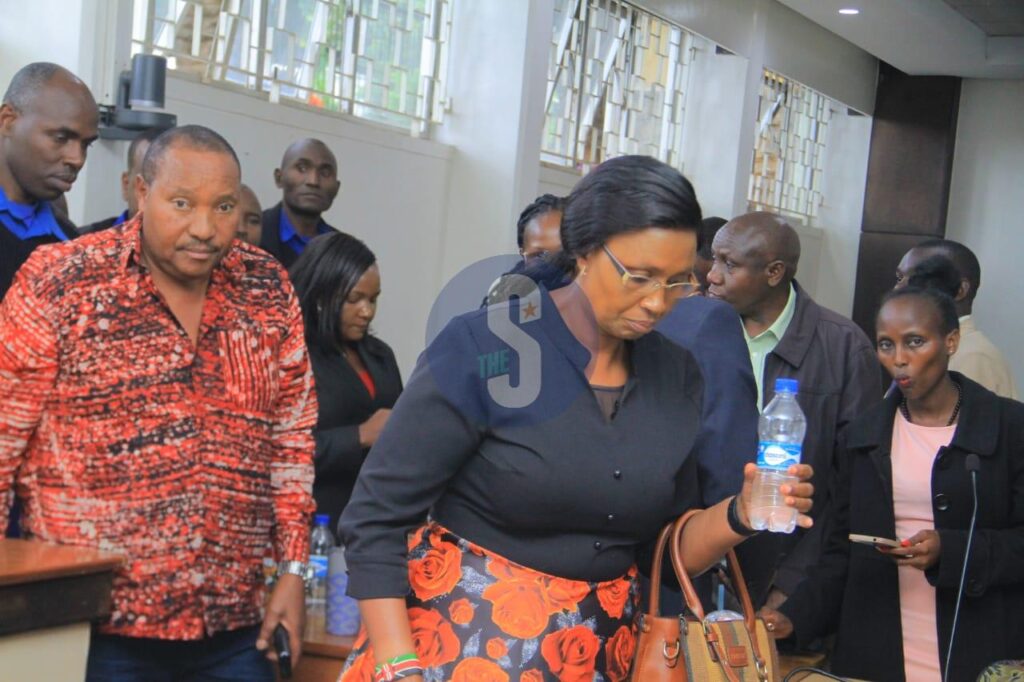 Ferdinard Wiaititu with his wife Susan Wangari Ndung'u leaving the  court. Photo: The Star