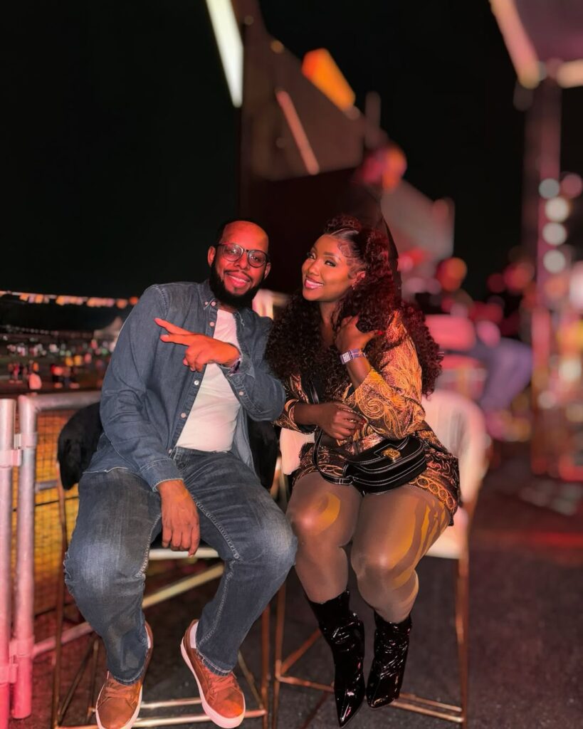 Kate Actress with Michael Mwangi enjoying life in a Burnaboy concert. Photo: Instagram