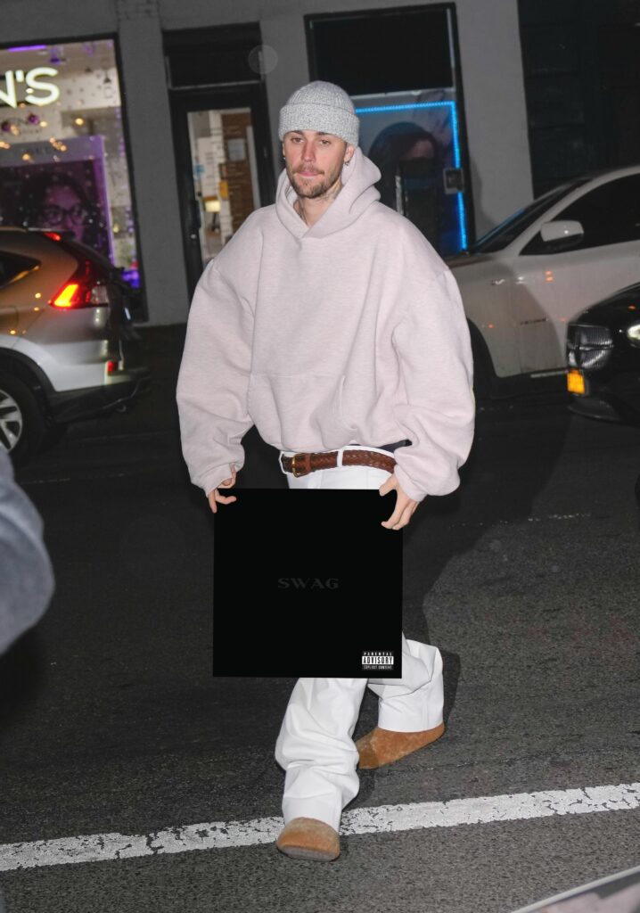 Justin Bieber holding his SWAG album. Photo: X