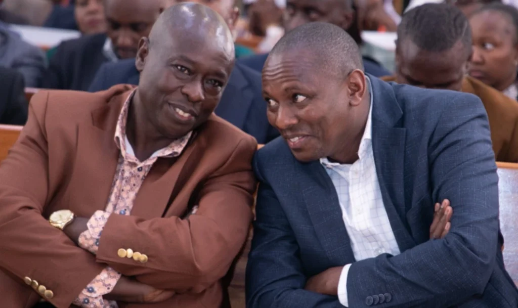 Gachagua sharing a joke with Ichung’wah. Photo: Online